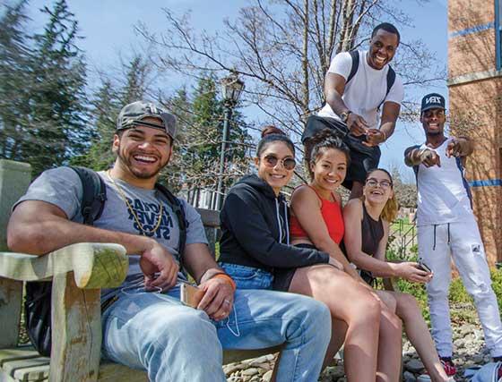 students in a group outside of the Powell Campus Center