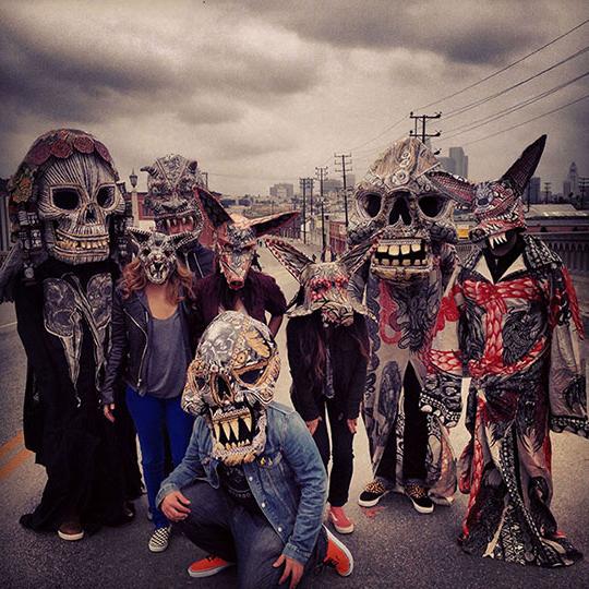 photo of people wearing weird, scary masks