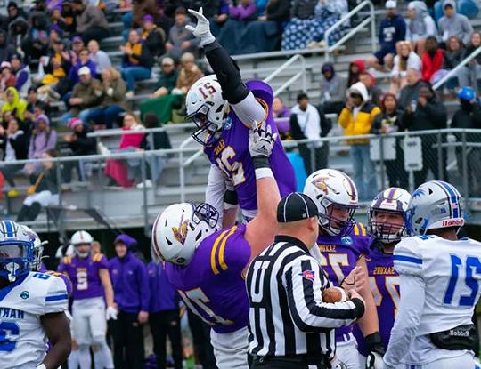 photo of football players celebrating