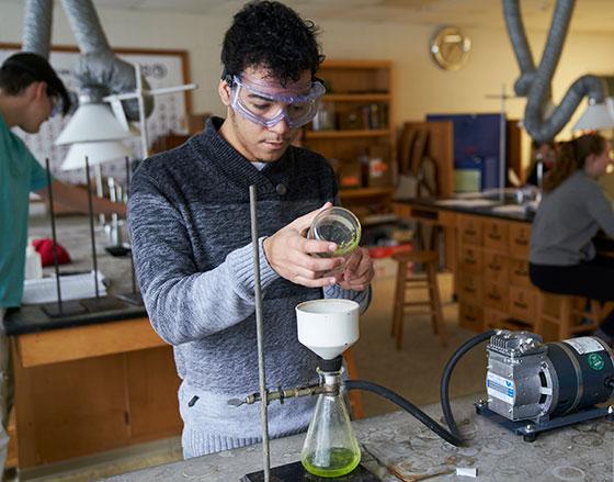 Male student in a biology lab