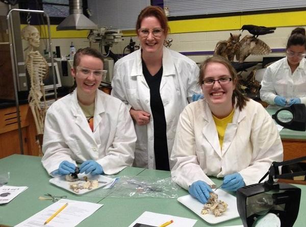 Professor and students in lab